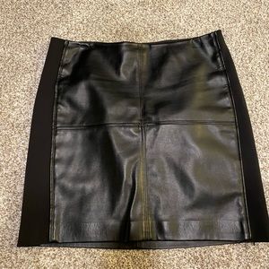 Leather skirt, but sides are not.